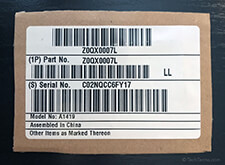 Serial number printed on the packaging of an iMac